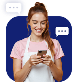 Smiling salon professional using QR code to offer clients instant access to services, reviews, and discounts via Krofile. 